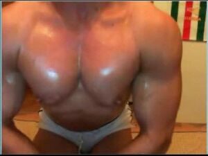 My FBB Flexes Her Rock Hard Pecs And Biceps