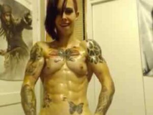 Tattooed Muscle Teen Poses After Oiling Up